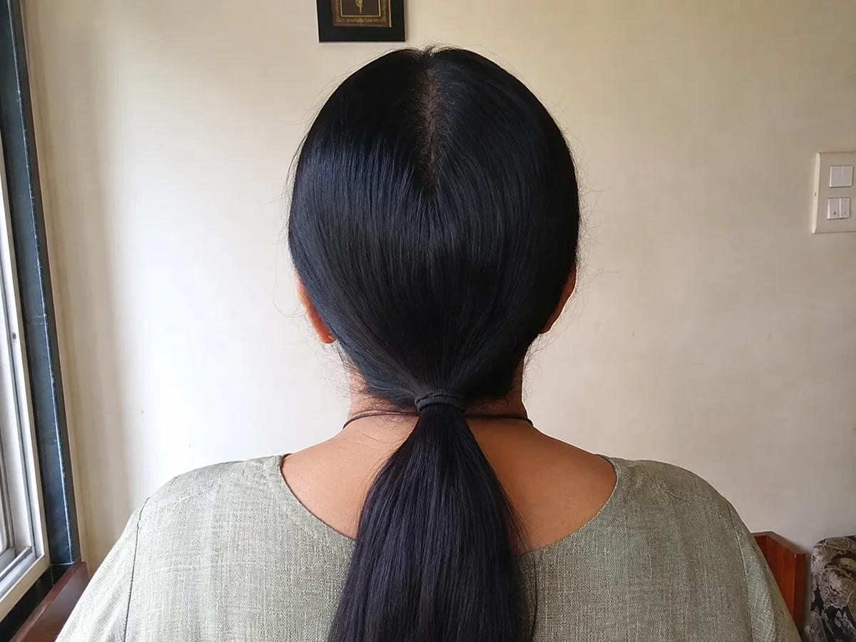 Hair after 8 weeks of using the herbal hair oil — visibly denser and healthier